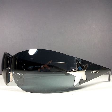 Prada SPR72G Sunglasses .